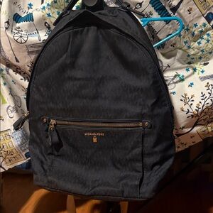Michael Kors Dark Backpack with Gold Accents